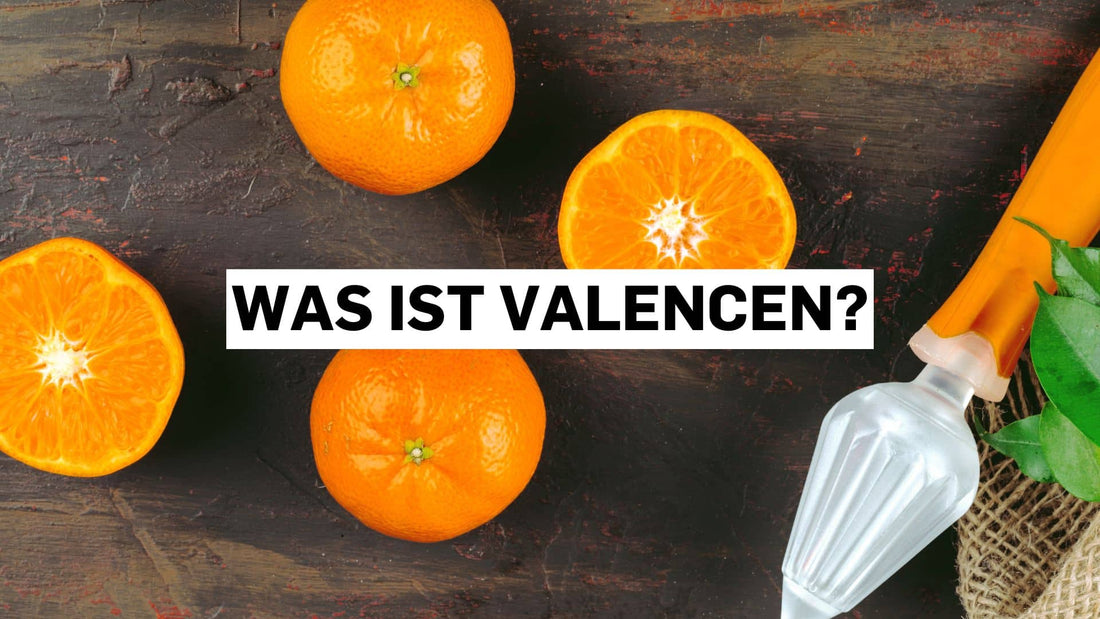 Valencia-Orangen mit Valencen auf einem Holztisch
